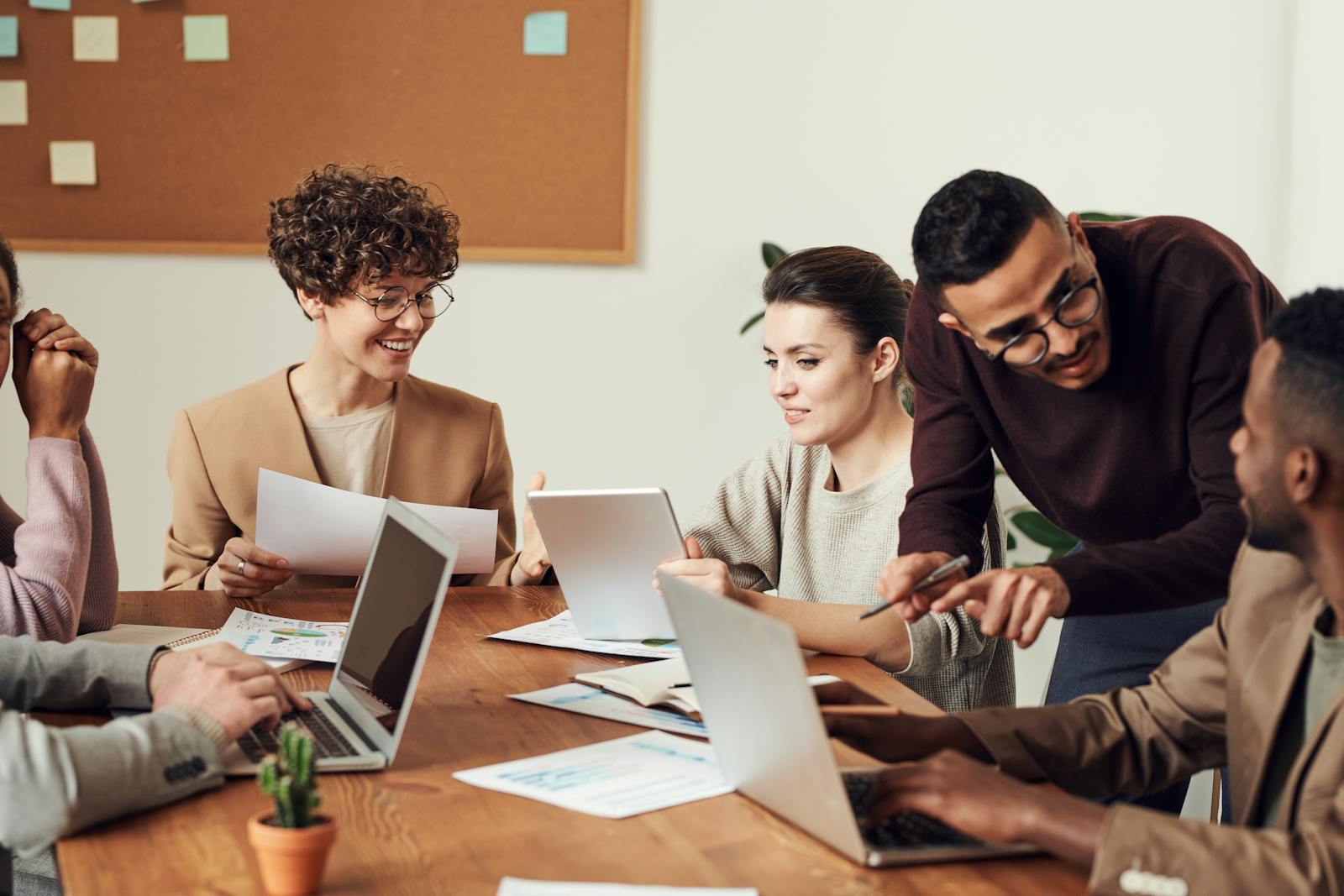 A diverse group collaborating around a table